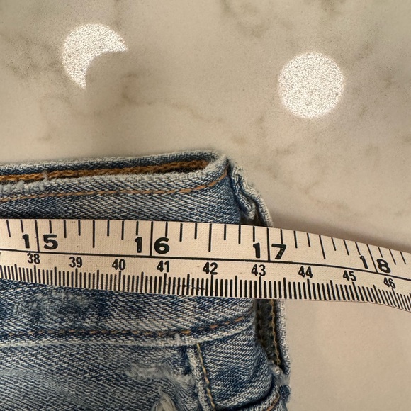 Levi’s Mid Rise Blue Denim Cut Off Shorts, size 28 - Picture 5 of 8